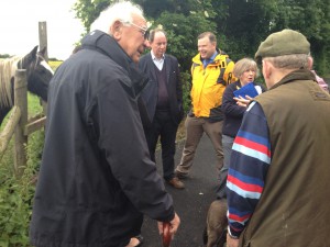 Edward McMillan-Scott  (second left) talks to local residents in Foxwood Lane