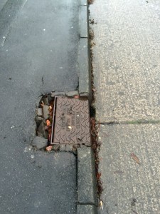 Broken drain cover St Stephens Square