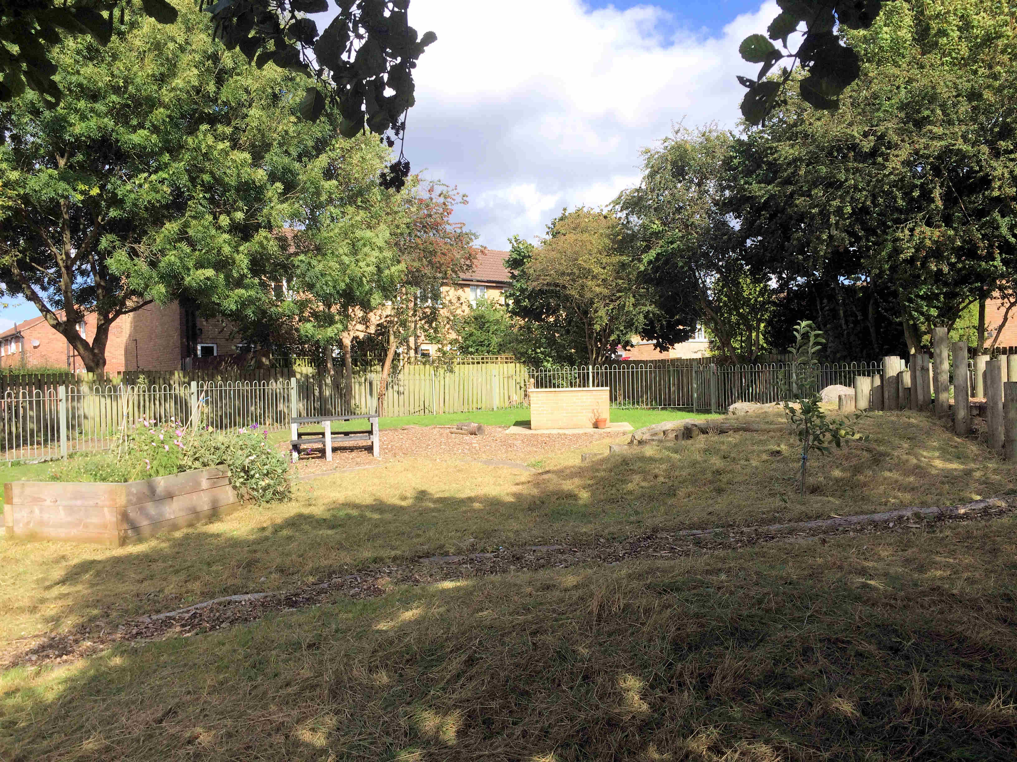 The grass has been cut at the Foxwood Community Centre. Residents meet every Saturday to undertake garden maintenance tasks near the centre